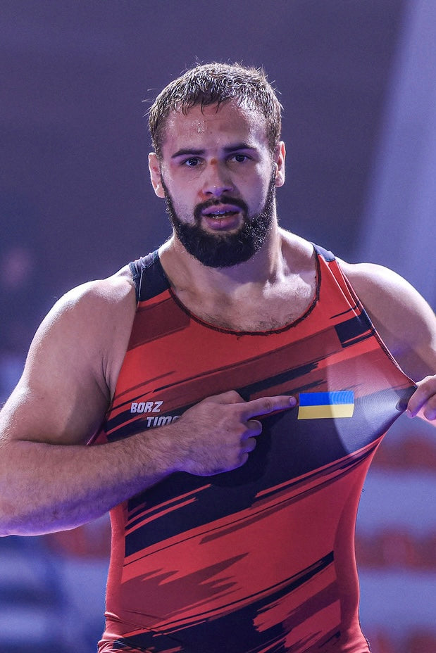 Wrestler wearing BORZ TIME singlet